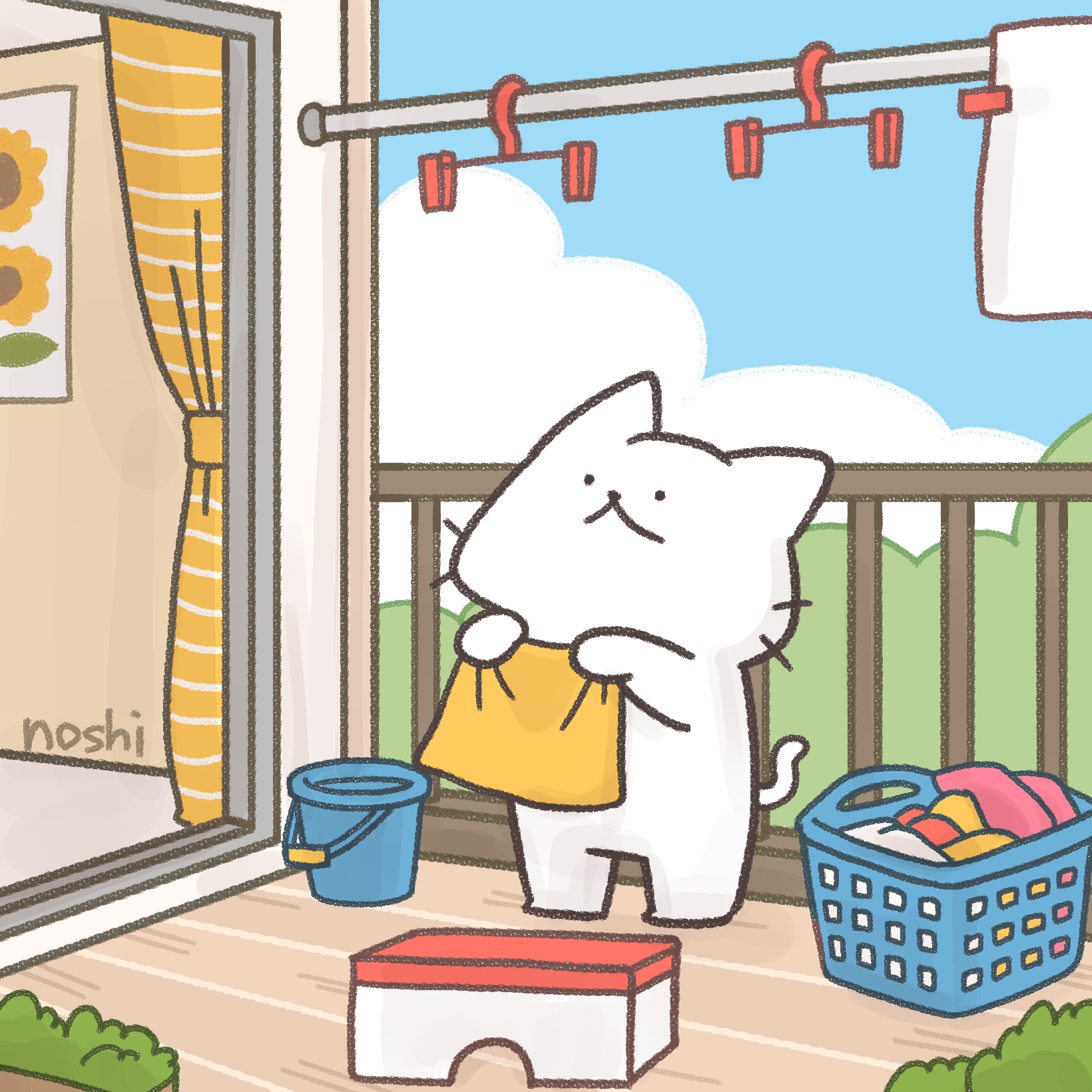ベランダで洗濯物を干すしろにゃん